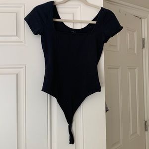 Black short sleeve thong UO body suit.